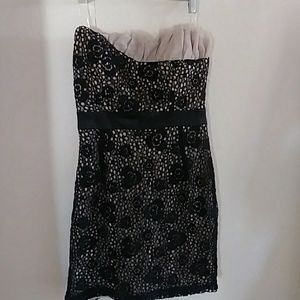 MYSTIC strapless dress.